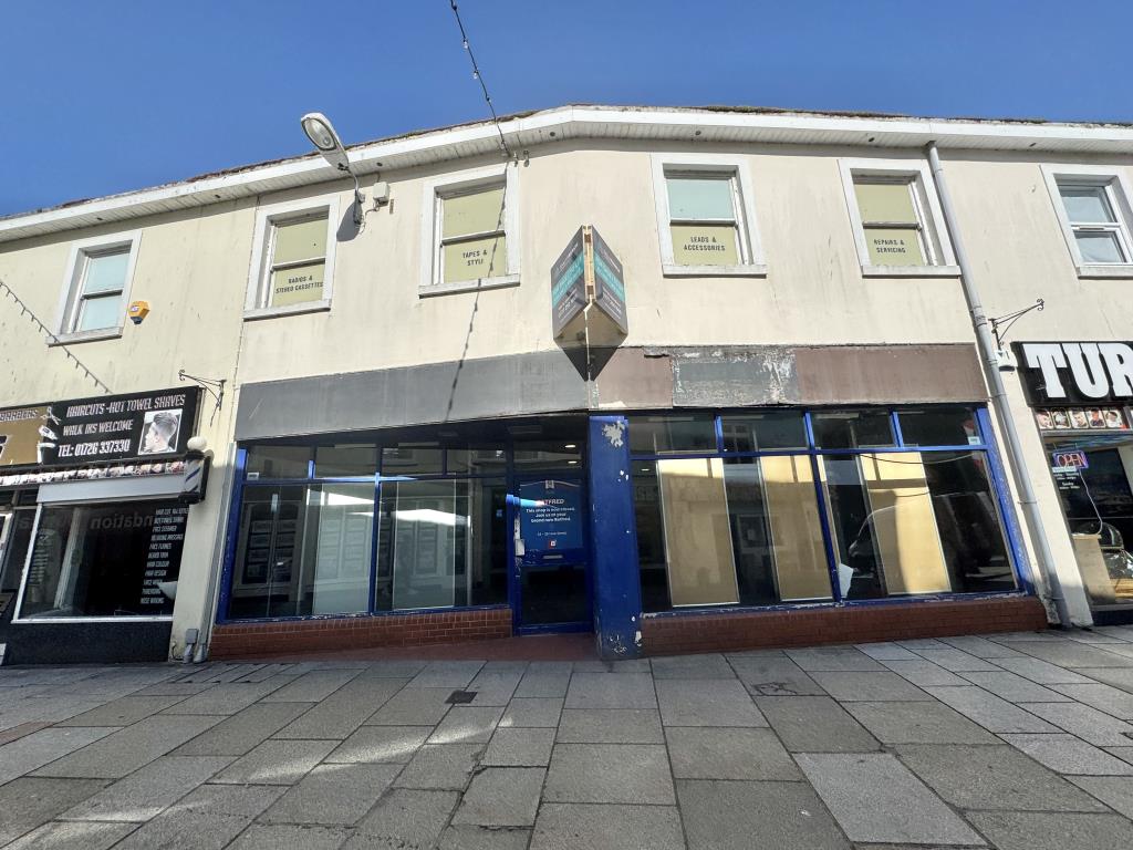 Lot: 46 - FREEHOLD TWO STOREY COMMERCIAL BUILDING IN PROMINENT TRADING LOCATION - Photo of the whole building